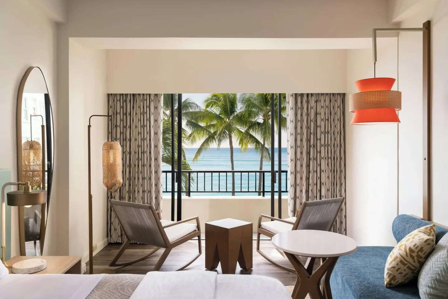 Ocean-view guest room seating area at Moana Surfrider, A Westin Resort & Spa.