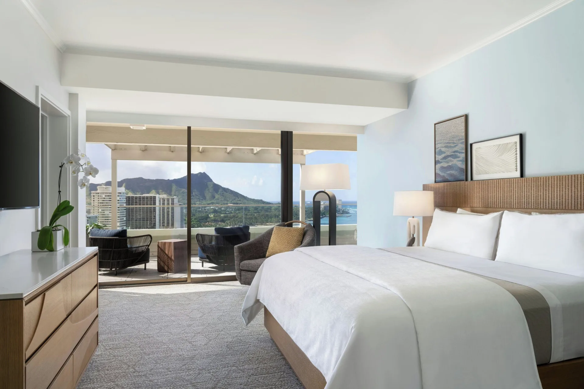 Penthouse Ocean Suite bedroom at Moana Surfrider, A Westin Resort & Spa with king bed and balcony facing Diamond Head.