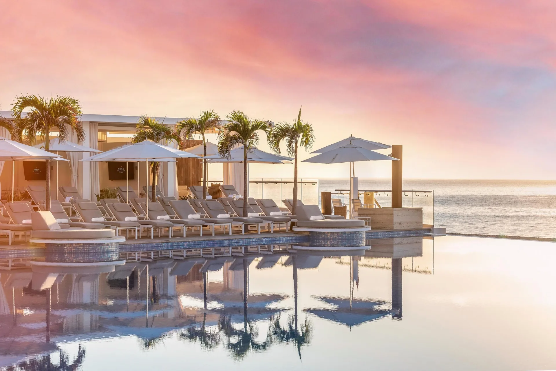 Le Blanc Spa Resort Los Cabos adults-only all-inclusive with infinity pools, modern suites, and beachfront luxury.