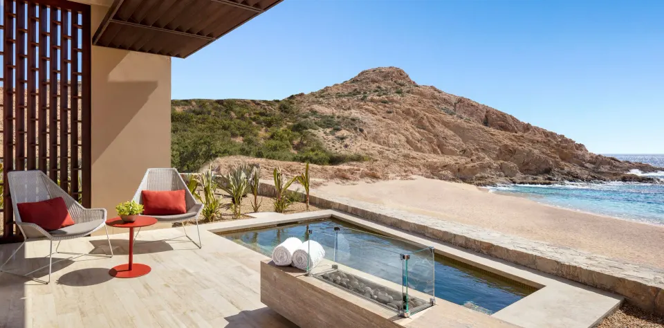 Private pool terrace beside the beach and rocky hill at Montage Los Cabos.