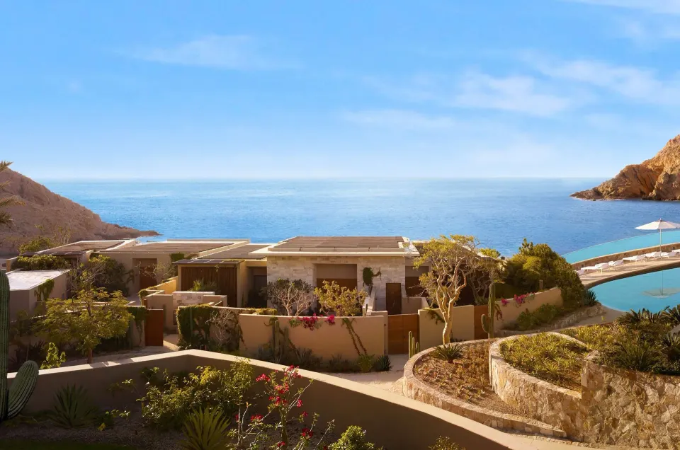 Suite rooftops and landscaped grounds overlooking the blue sea at Montage Los Cabos.
