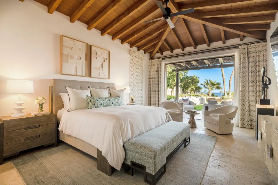 Casa Cardon bedroom with king bed and patio view at Montage Los Cabos.