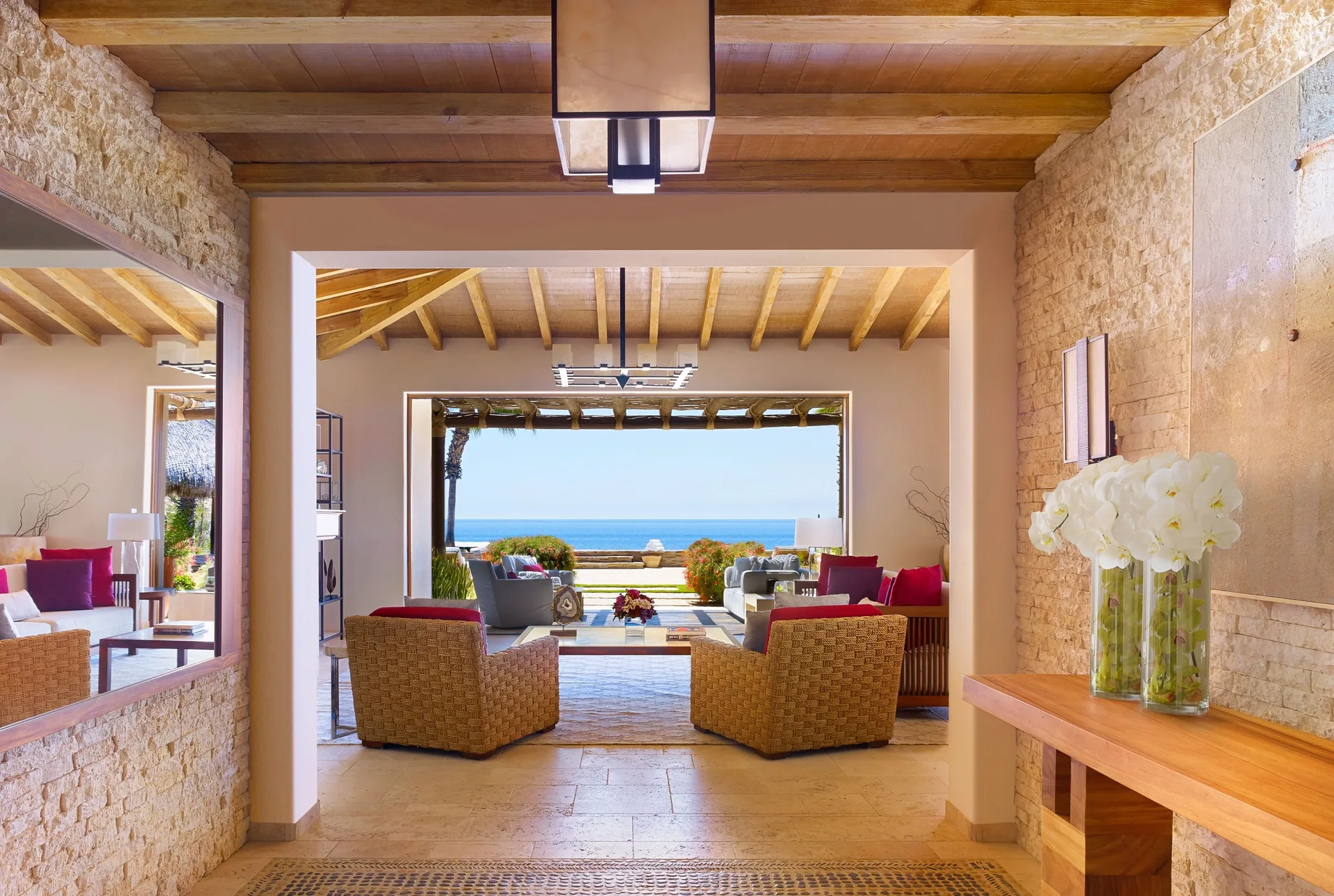 Entry hall of Casa Cardon Five Bedroom Home at Montage Los Cabos looking toward an ocean-facing lounge.