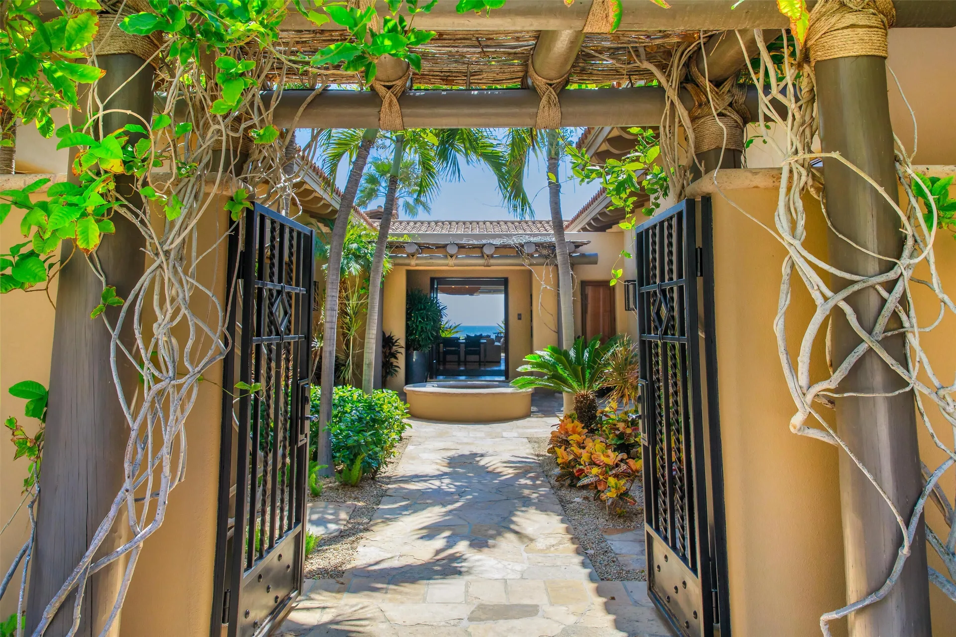 Casa Santa Maria entry gate and garden walkway at Montage Los Cabos.