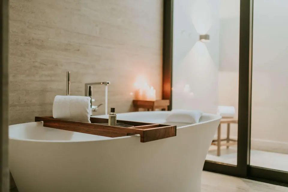 Bathroom soaking tub with bath tray in a Coastal View Accessible Room at Montage Los Cabos.