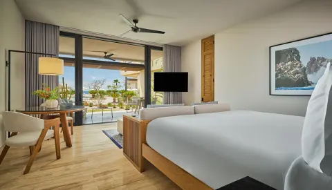 Deluxe Ocean View Room with king bed and patio view at Montage Los Cabos.