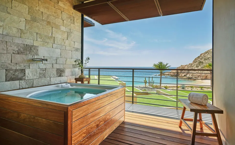 Balcony soaking tub with ocean and beach view at Montage Los Cabos.