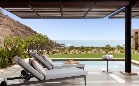 Pool terrace of the Ocean Front Three Bedroom Suite with Pool at Montage Los Cabos overlooking the ocean.