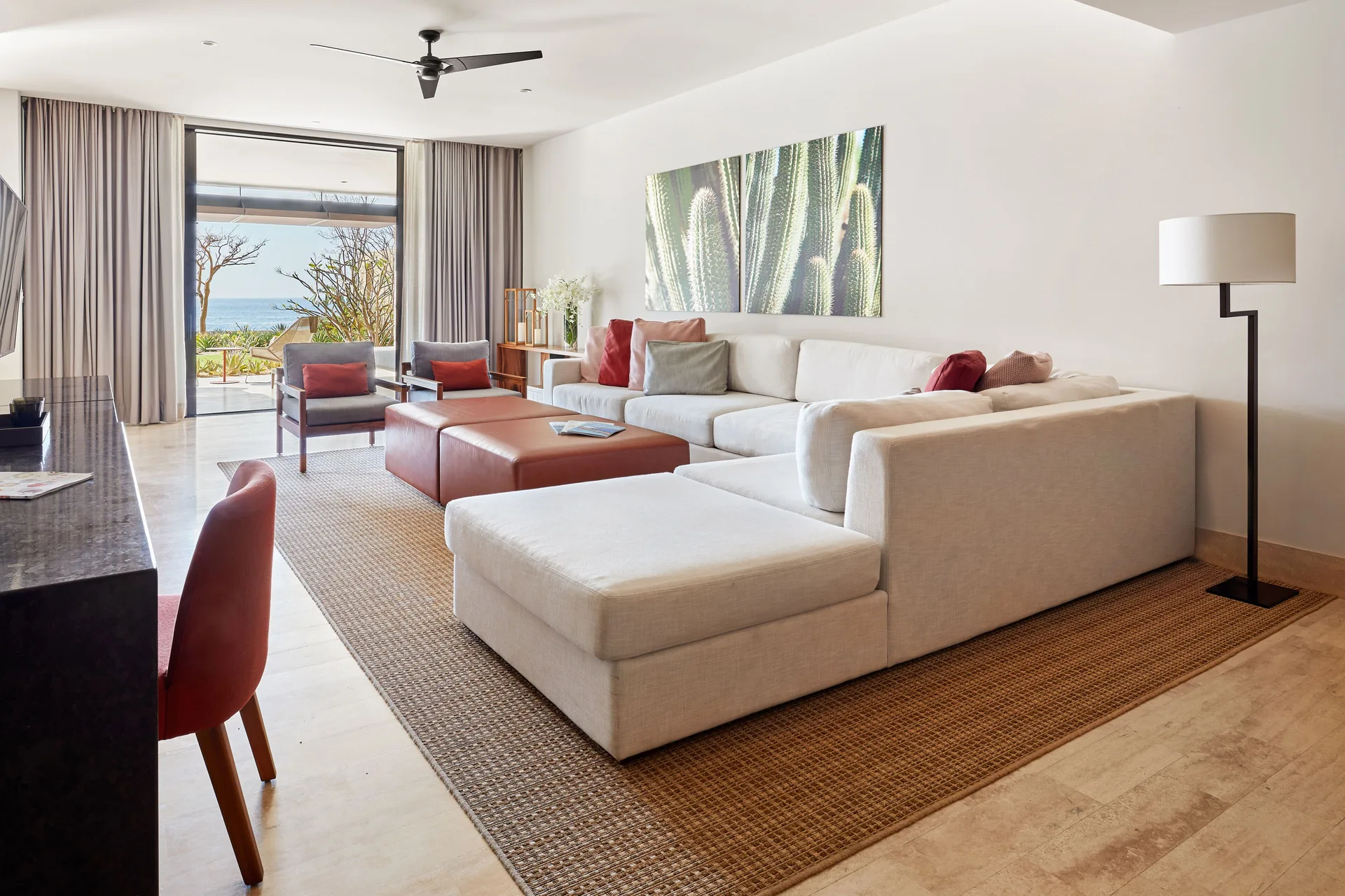 Ocean Front Two Bedroom Suite living room with terrace view at Montage Los Cabos.