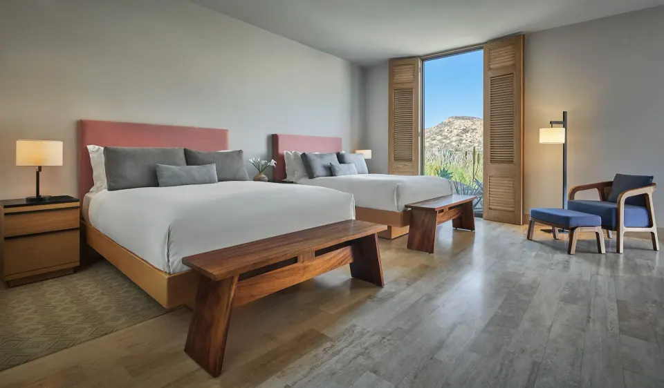 Ocean Front Two Bedroom Suite bedroom with two beds at Montage Los Cabos.