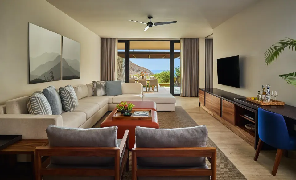 Ocean View One Bedroom Suite living room opening to terrace at Montage Los Cabos.