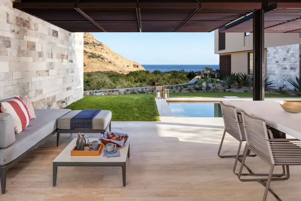 Ocean View One Bedroom Suite patio lounge and pool at Montage Los Cabos.