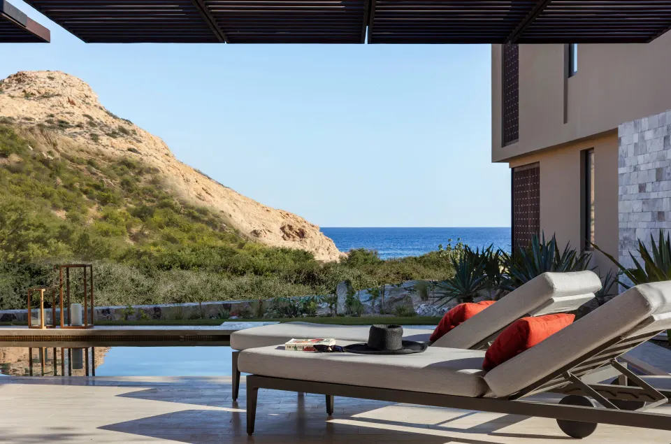 Ocean View One Bedroom Suite pool terrace with loungers at Montage Los Cabos.