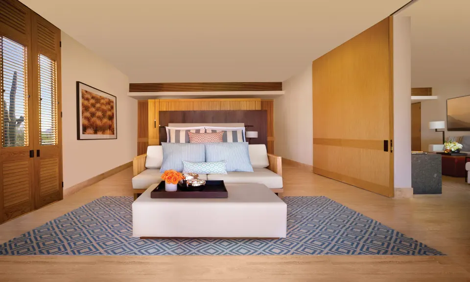 Ocean View One Bedroom Suite bed and sitting area at Montage Los Cabos.
