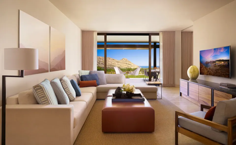 Ocean View One Bedroom Suite living room with terrace view at Montage Los Cabos.