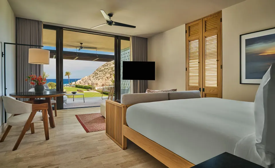 Ocean View Room with Pool bedroom at Montage Los Cabos with bed, dining table, terrace and sea view.