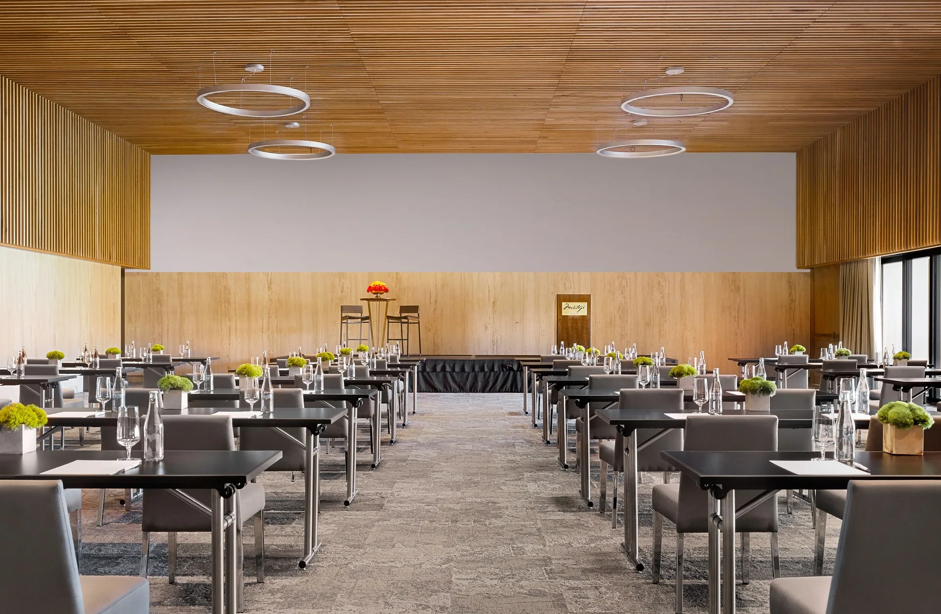 Conference room set with rows of tables and chairs at Montage Los Cabos.