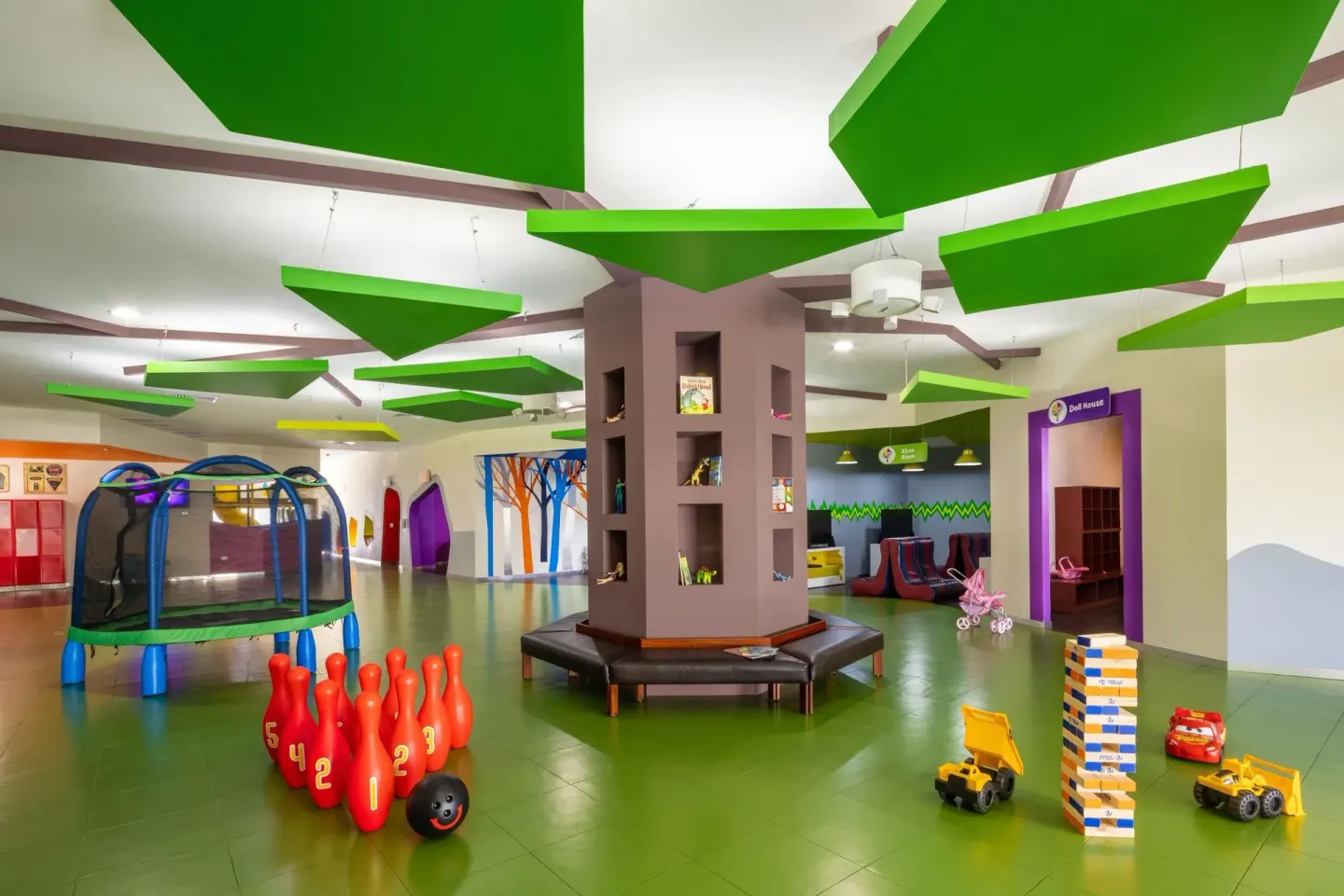 A colorful kids playroom with toys and play zones at Moon Palace Cancun.
