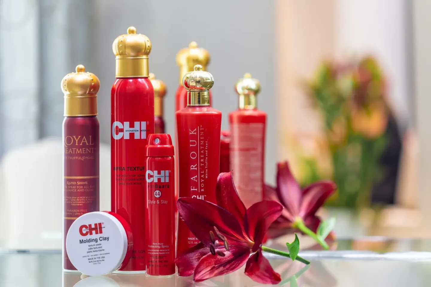 Hair care products and a red lily displayed in the spa at Moon Palace Cancun.