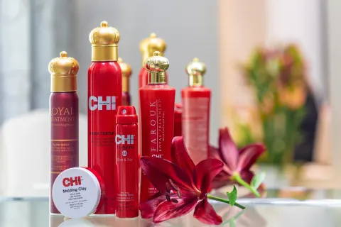 Hair care products and a red lily displayed in the spa at Moon Palace Cancun.
