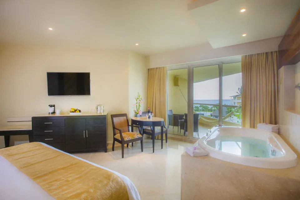 Superior Deluxe Ocean View king room with tub and balcony at Moon Palace Cancun.