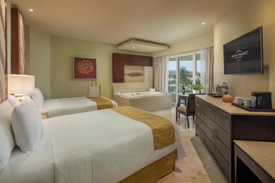 Superior Deluxe Ocean View double-bed room with whirlpool tub at Moon Palace Cancun.