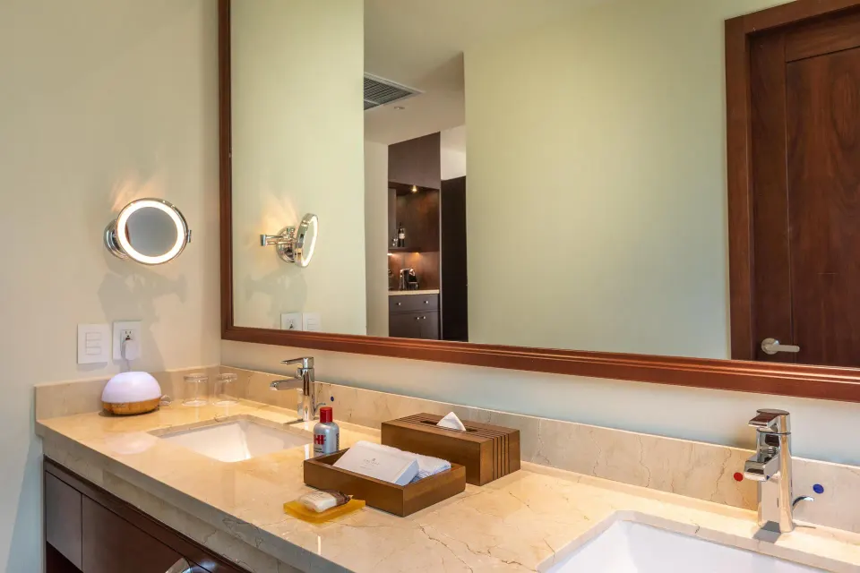 Superior Governor Suite double vanity with large mirror at Moon Palace Cancun.