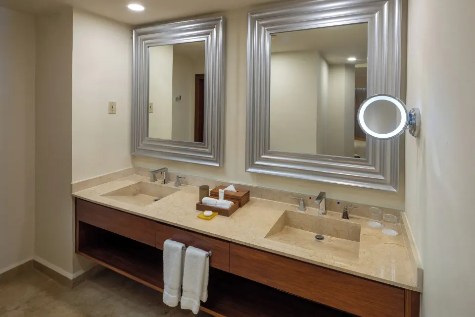 Superior Two Bedroom Presidential Suite bathroom vanity with twin sinks at Moon Palace Cancun.