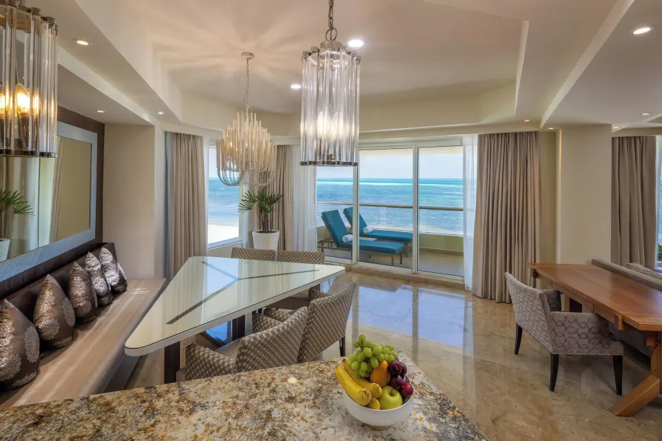 Superior Two Bedroom Presidential Suite dining area with ocean view at Moon Palace Cancun.