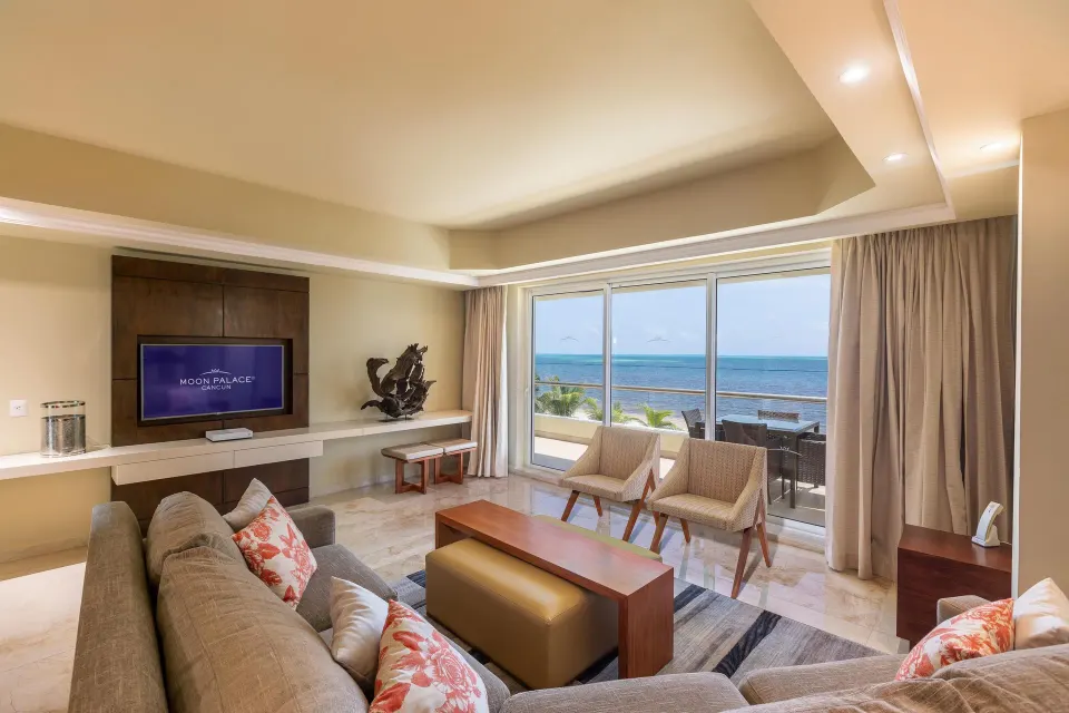 Superior Two Bedroom Presidential Suite living room with ocean balcony at Moon Palace Cancun.