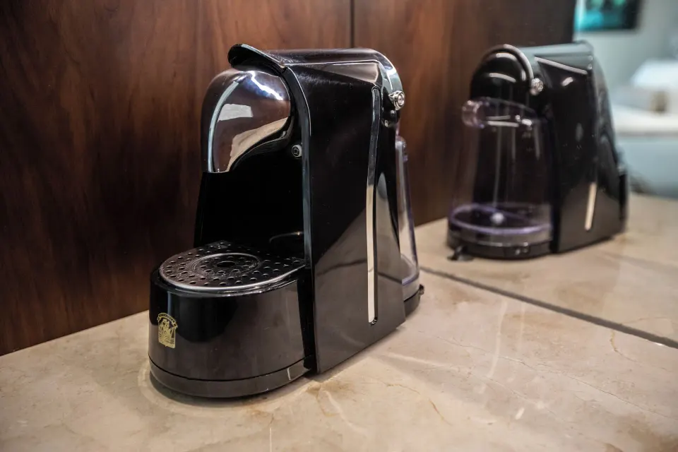 Single-serve coffee makers on a marble counter in a villa at Moon Palace Cancun.