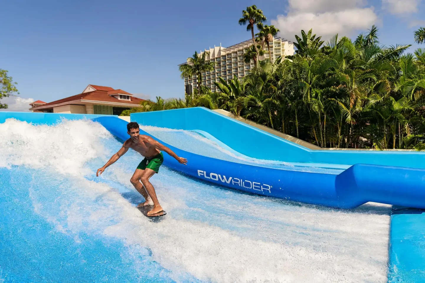 A guest rides a surf simulator at Moon Palace Jamaica.