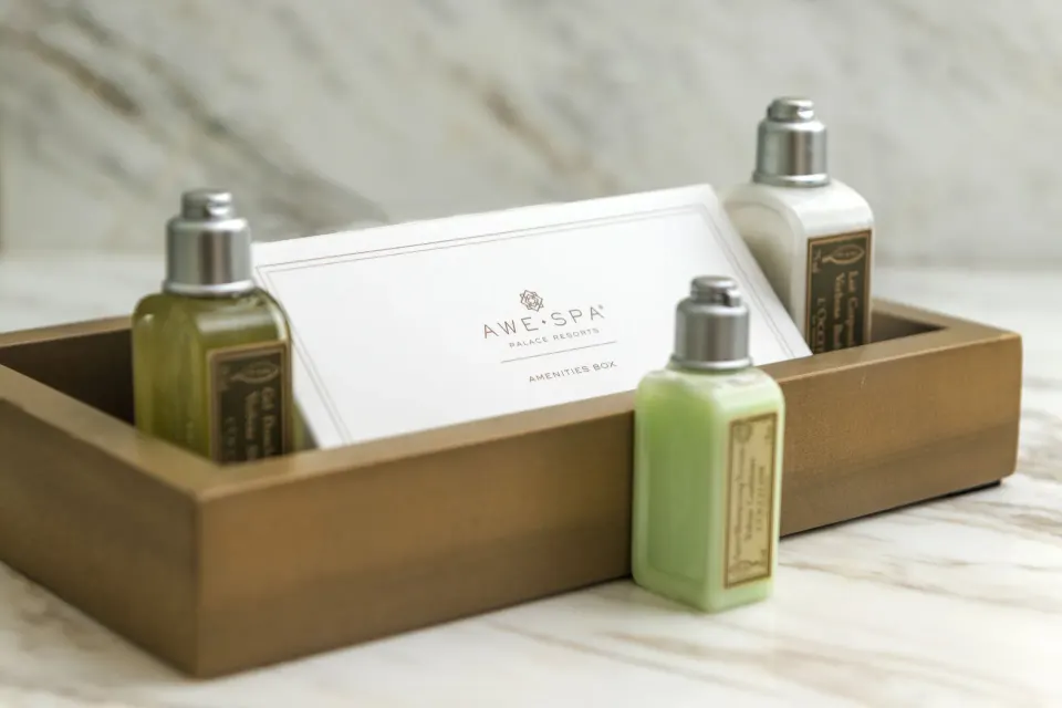 Amenity bottles in a tray inside a Superior Honeymoon Suite at Moon Palace Jamaica.
