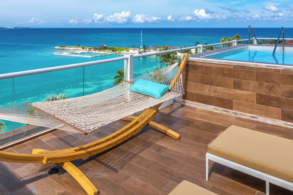 Three Bedroom Villa terrace hammock beside the pool at Moon Palace Jamaica.