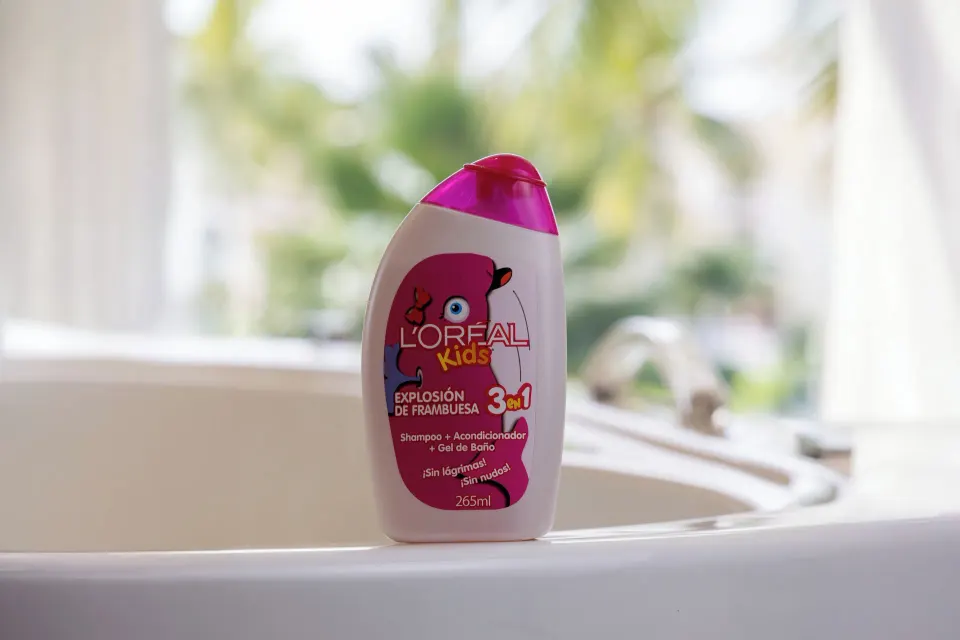 Kids bath amenity bottle on a tub ledge in a Superior Family Suite at Moon Palace Nizuc.