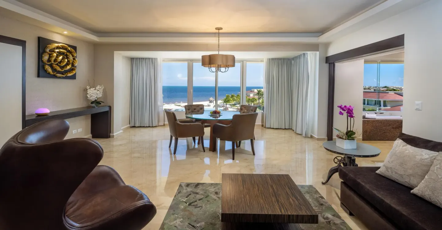 Superior Governor Suite ocean-view living and dining area at Moon Palace Nizuc.