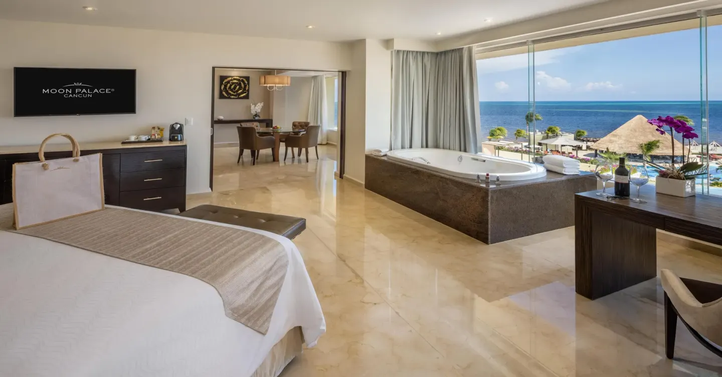Superior Governor Suite ocean-view king bedroom with soaking tub at Moon Palace Nizuc.