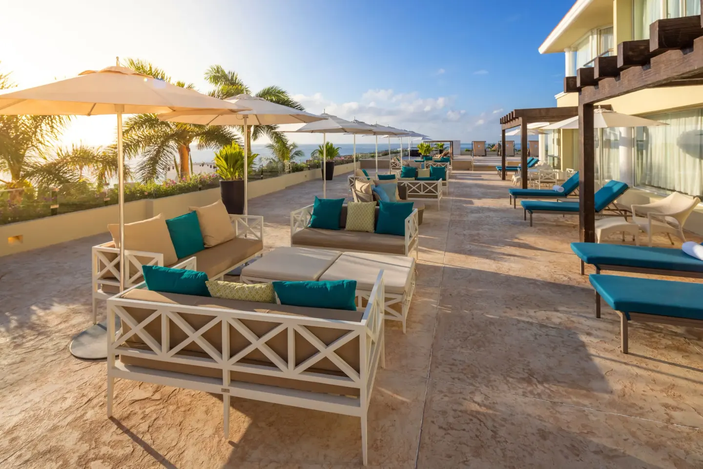 Superior Governor Suite ocean-view terrace seating at Moon Palace Nizuc.
