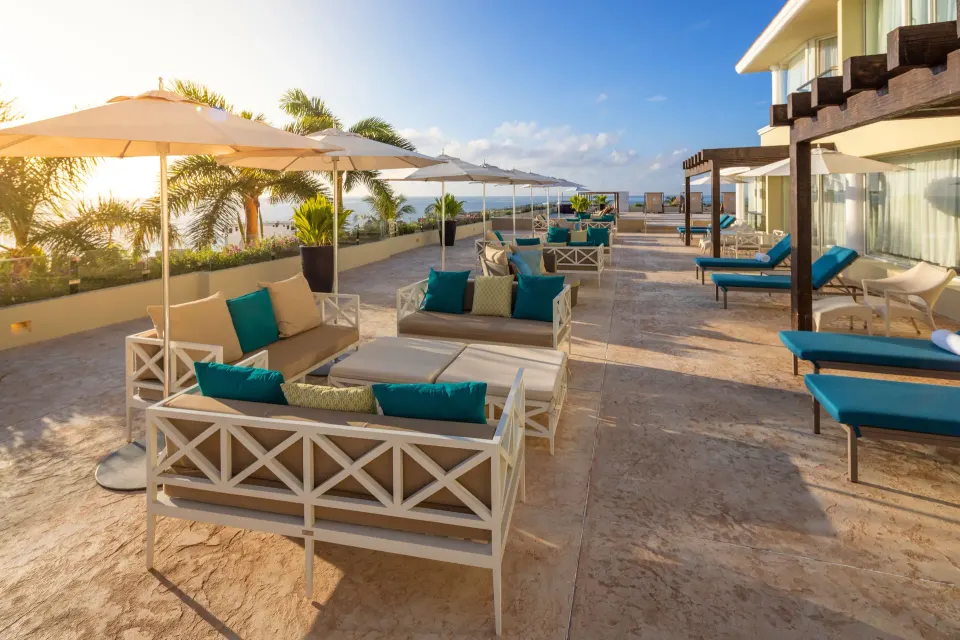 Superior Governor Suite ocean-view terrace seating at Moon Palace Nizuc.