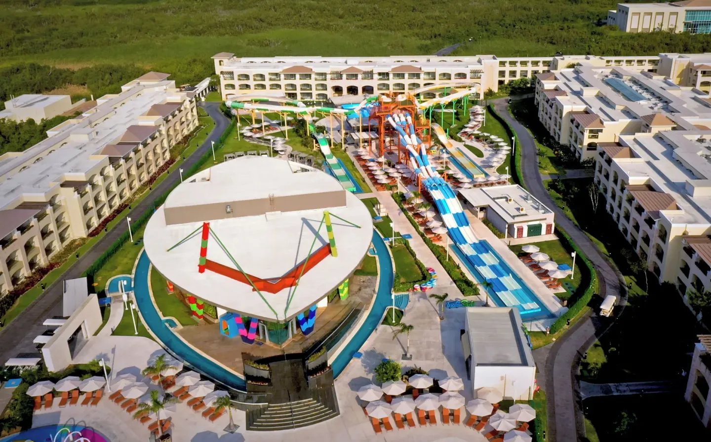 Aerial view of the water park and resort buildings at Moon Palace The Grand Cancun.