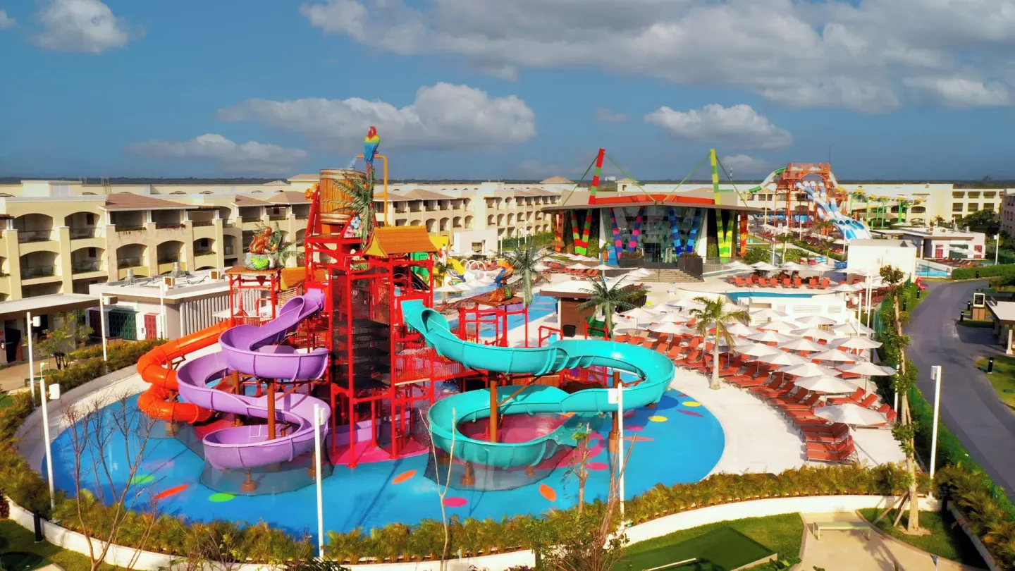 Colorful water slides and sun loungers at Moon Palace The Grand Cancun.