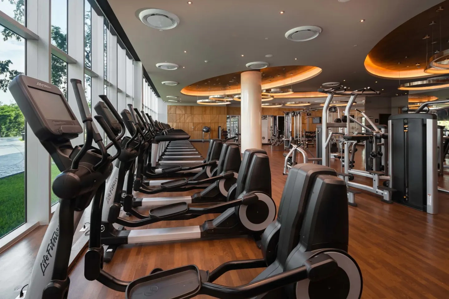 Fitness center with cardio machines and weight equipment at Moon Palace The Grand Cancun.