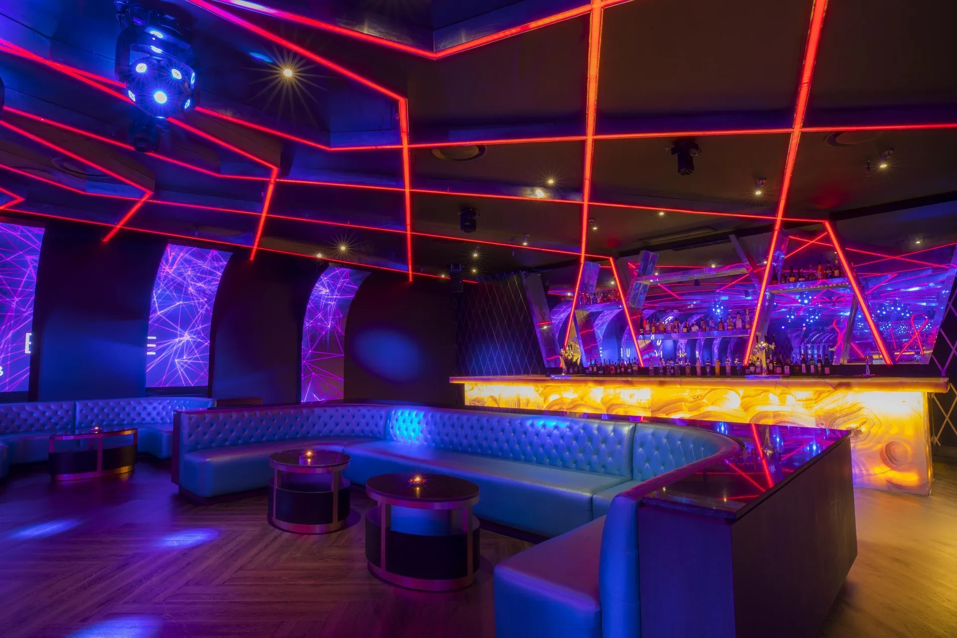 Neon-lit nightclub lounge and bar at Moon Palace The Grand Cancun.