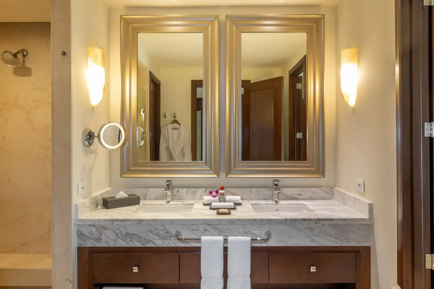 Grand Deluxe Garden View bathroom vanity with twin mirrors at Moon Palace The Grand Cancun.