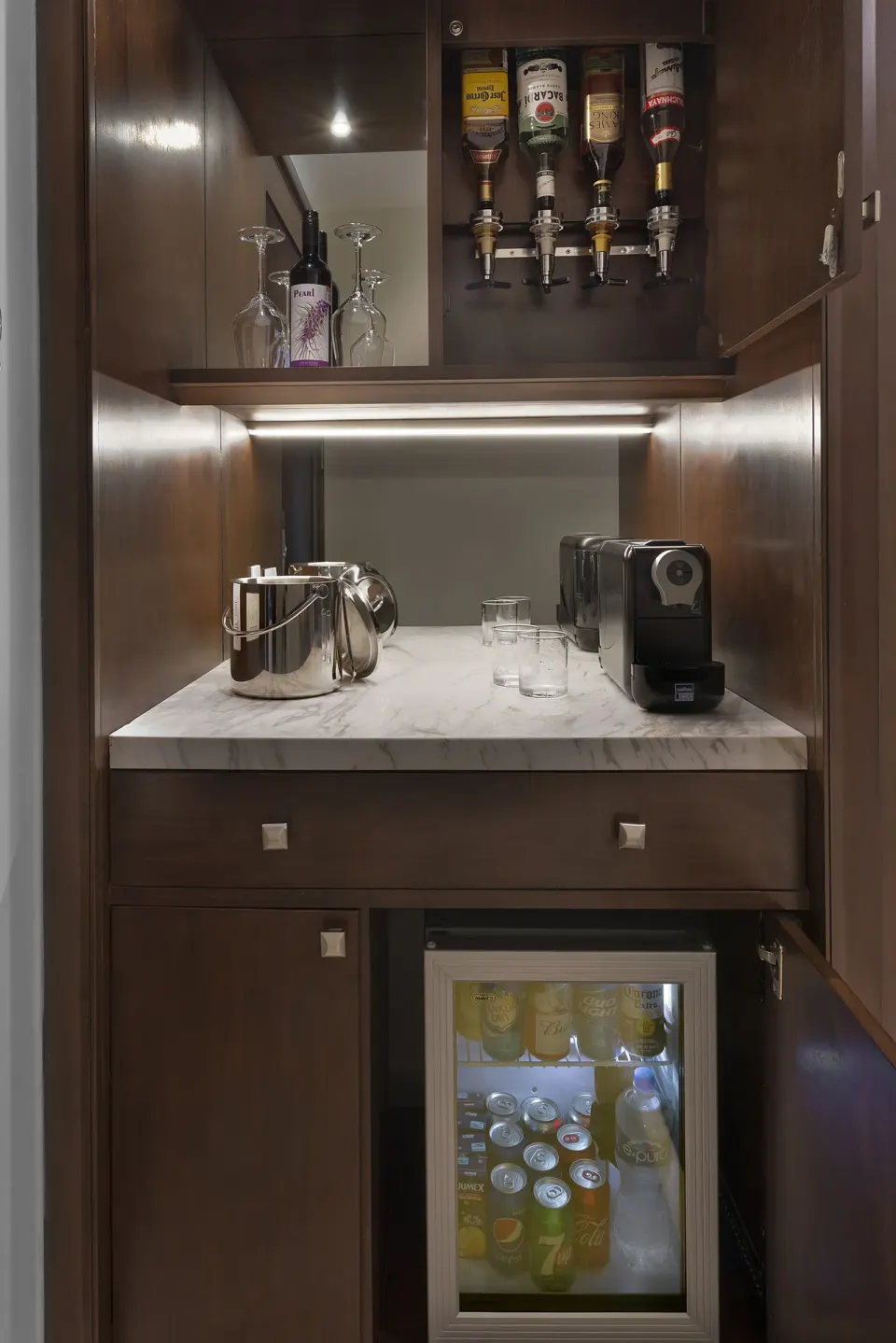 Grand Deluxe Garden View minibar and beverage cabinet at Moon Palace The Grand Cancun.