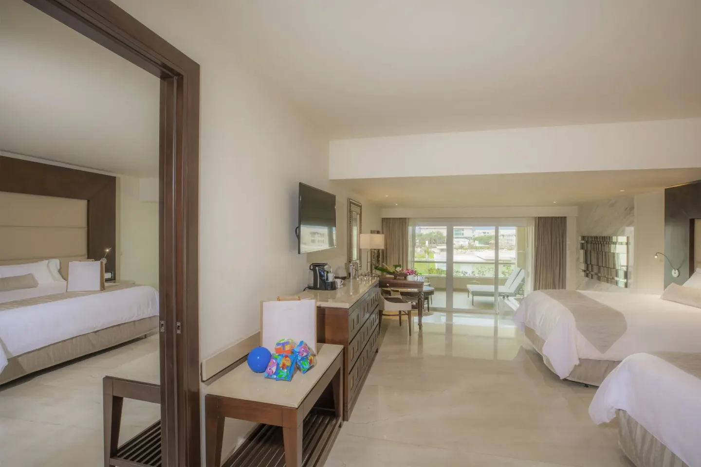 Grand Family Suite Garden View with connecting bedroom and balcony at Moon Palace The Grand Cancun.