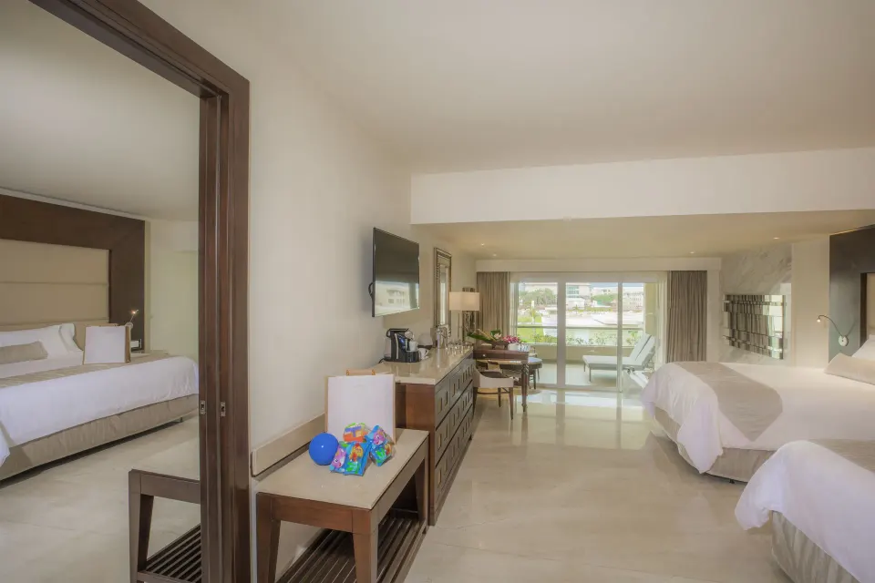 Grand Family Suite Garden View with connecting bedroom and balcony at Moon Palace The Grand Cancun.