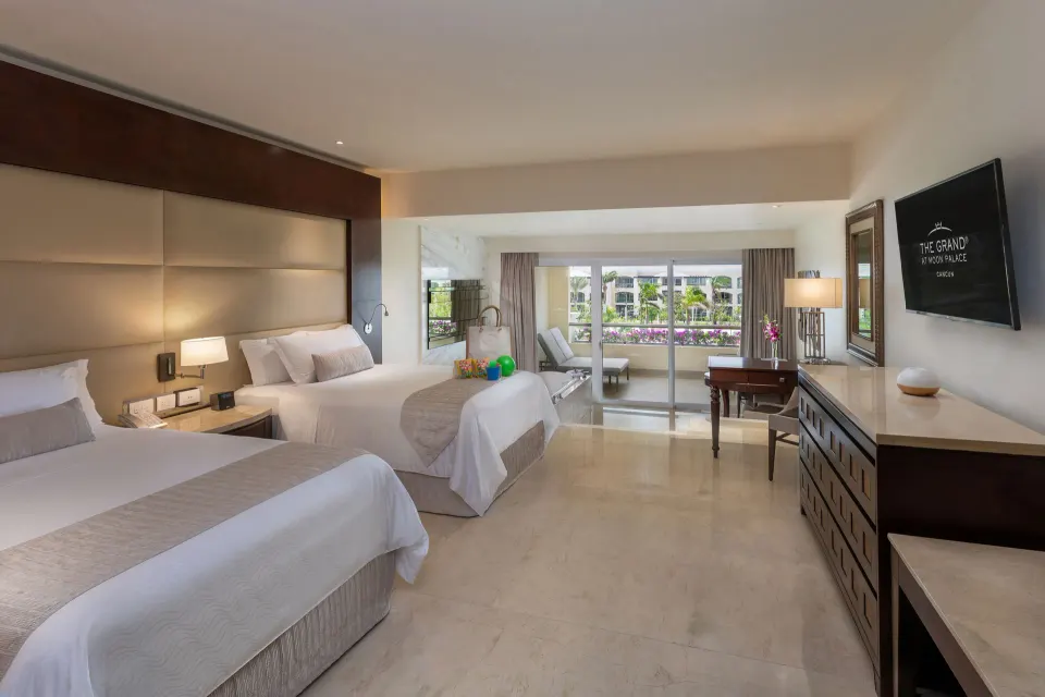 Grand Family Suite Garden View with two beds and balcony at Moon Palace The Grand Cancun.