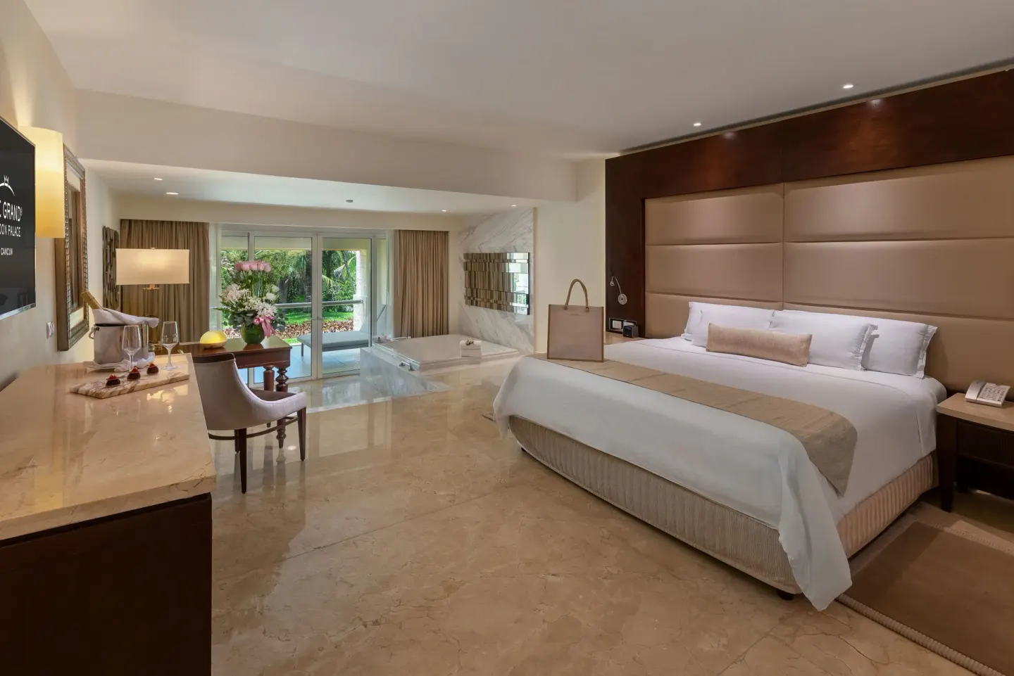 Grand Honeymoon Suite with king bed and in-room tub at Moon Palace The Grand Cancun.