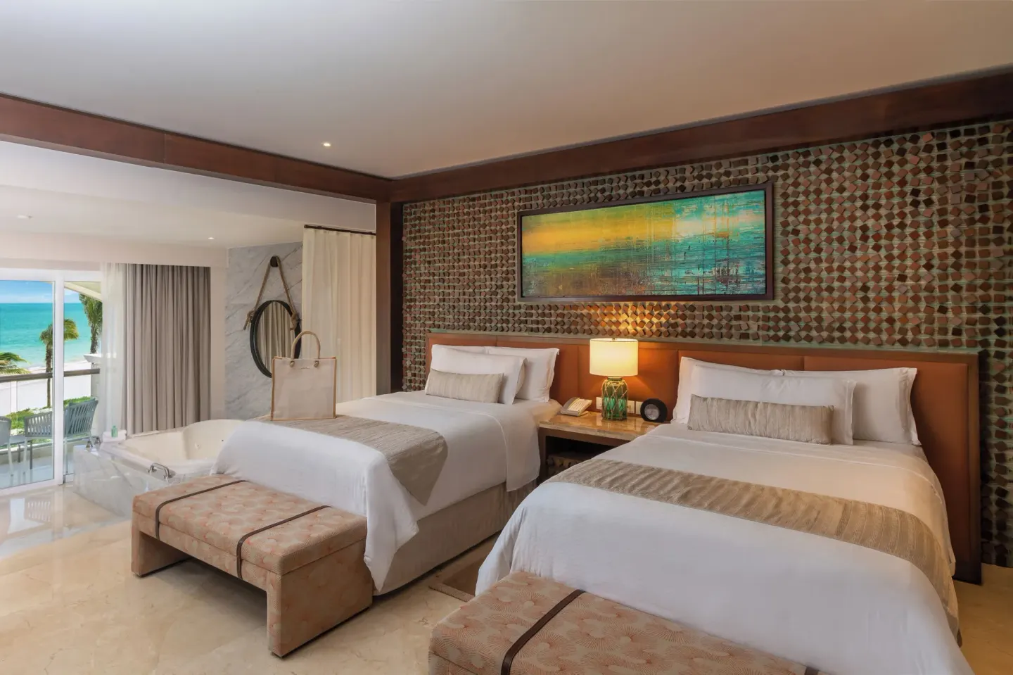 Grand Villa Four Bedroom with two beds and ocean-facing balcony at Moon Palace The Grand Cancun.
